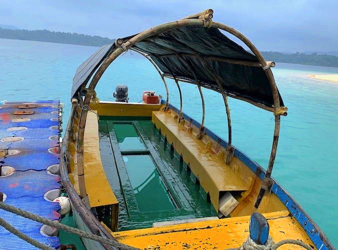 A glass-bottom boat over the coral reef at North Bay Island
